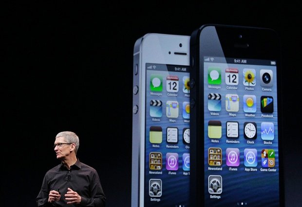 Tim Cook introducing the iPhone 5 (Photo credit: AP)