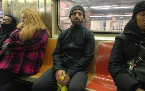 Google co-founder Sergey Brin wearing a Google Glass prototype at the subway.