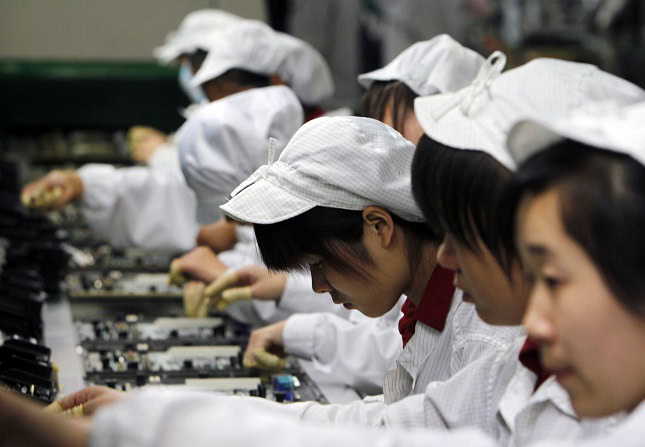 Foxconn factory assembly line, China.