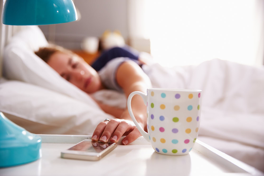 girl-sleeping-phone