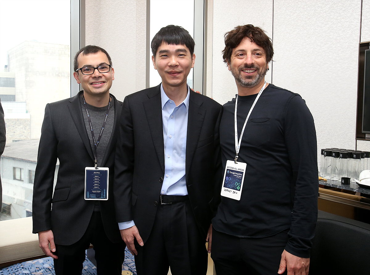 Lee Sedol (center) with DeepMind founder Demis Hassabis (left) and Google founder Sergey Brin (right)