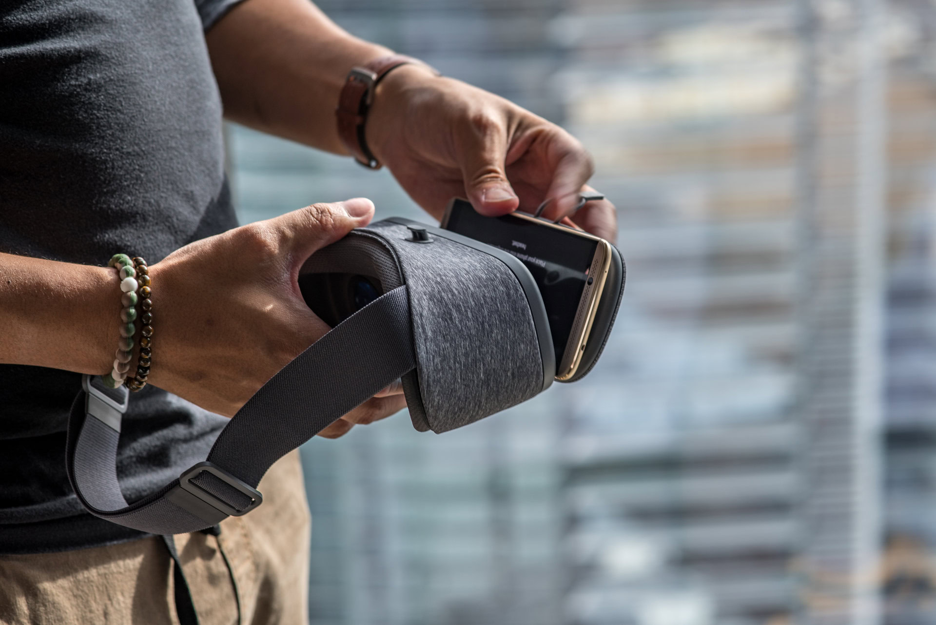 A ZTE Axon 7 being placed into a Google Daydream headset. 