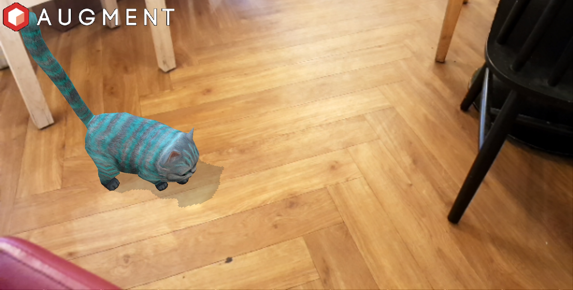 Photo of an augmented reality cat in a room.