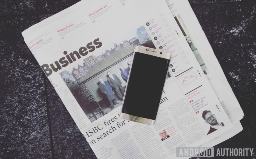 Android phone on a newspaper - how to avoid phone scams