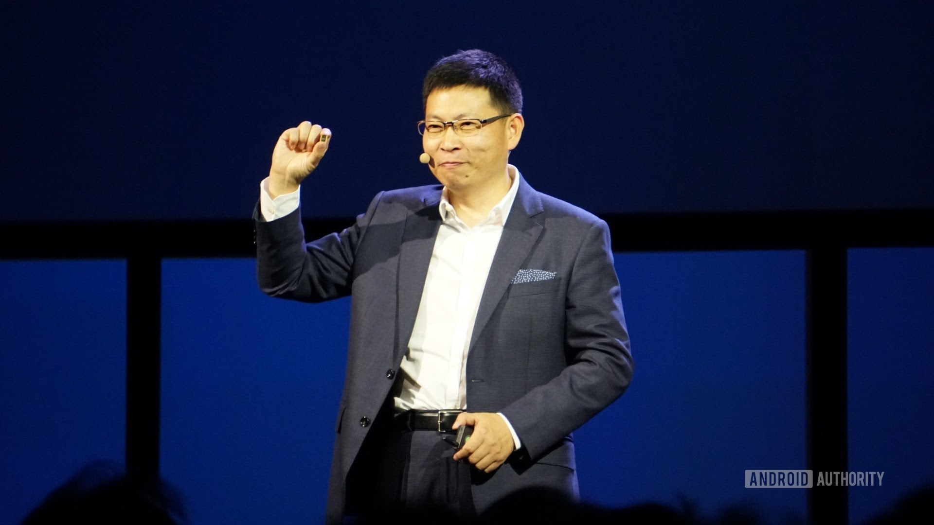 Huawei's Richard Yu holding the Kirin 970 chipset. 