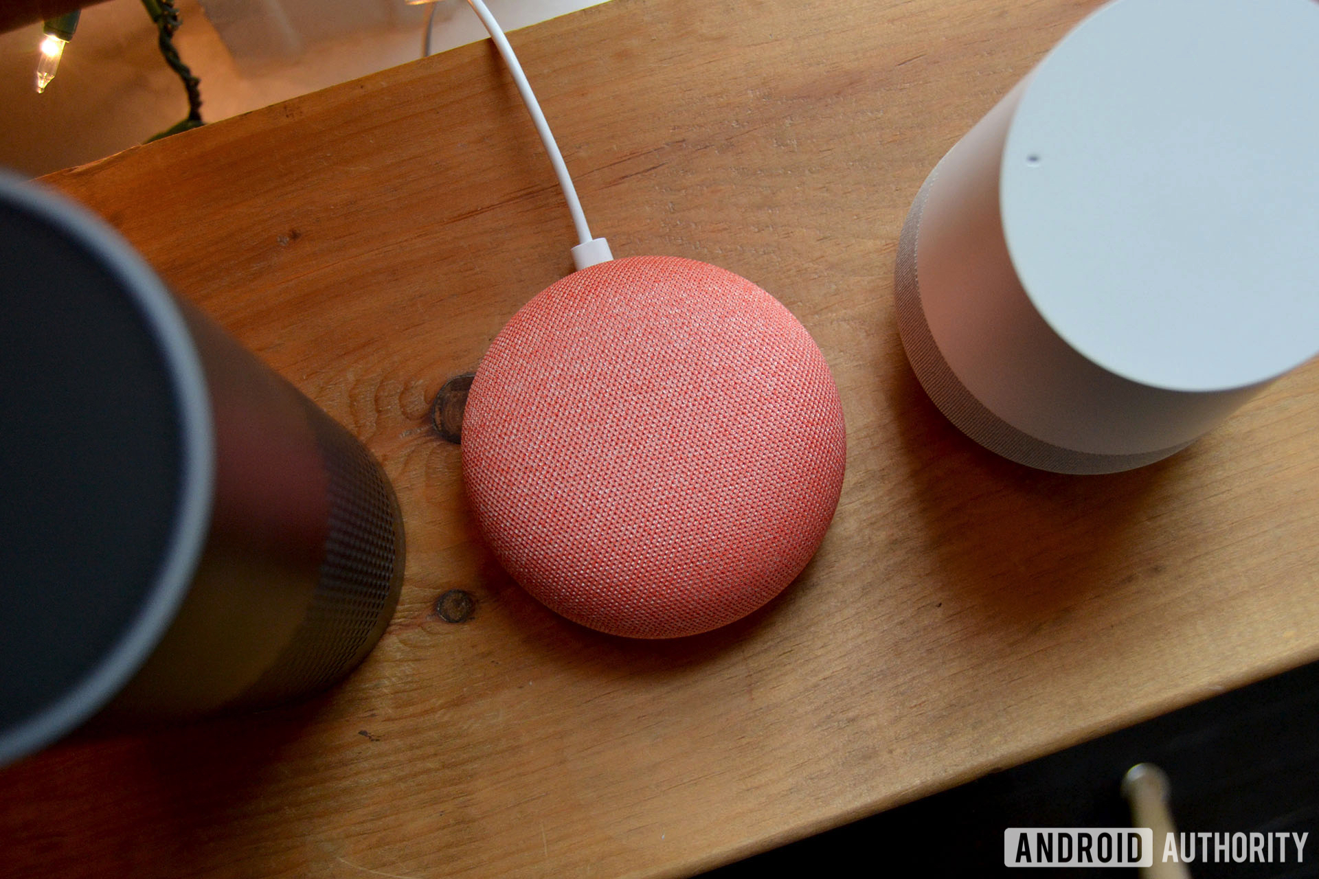 Google and Amazon smart speakers on a ledge