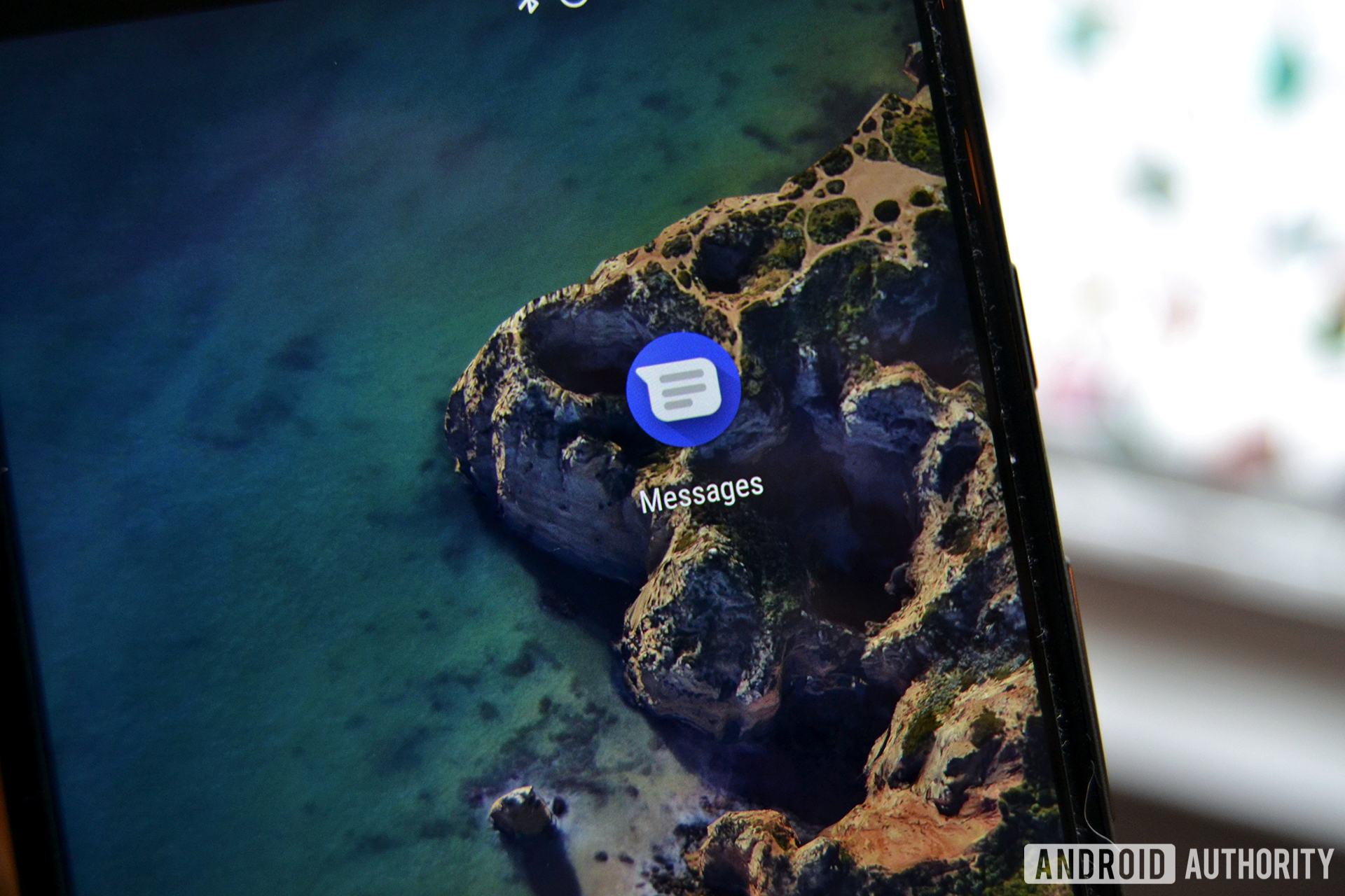 A closeup image of the Android Messages icon on a Google Pixel 2 XL.