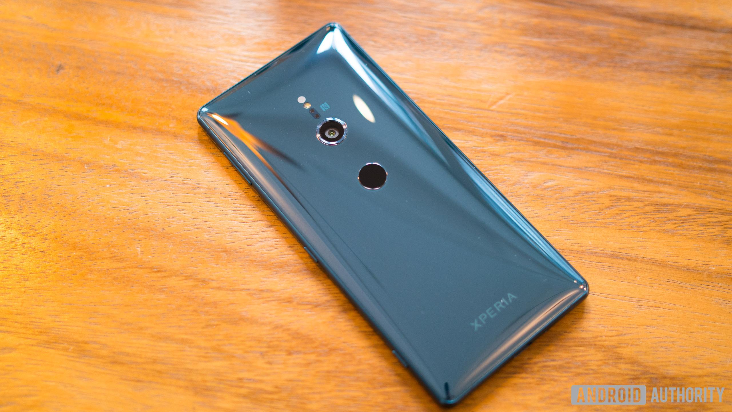 Photo of a gray Sony Xperia XZ2 on a wooden table - Sony review 2019