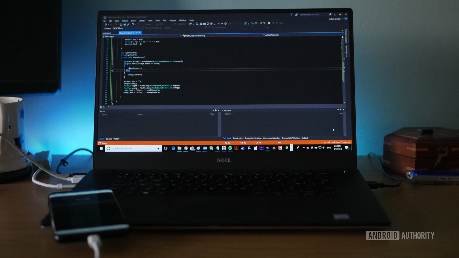 Photo of a laptop with a running Android Studio used for game development