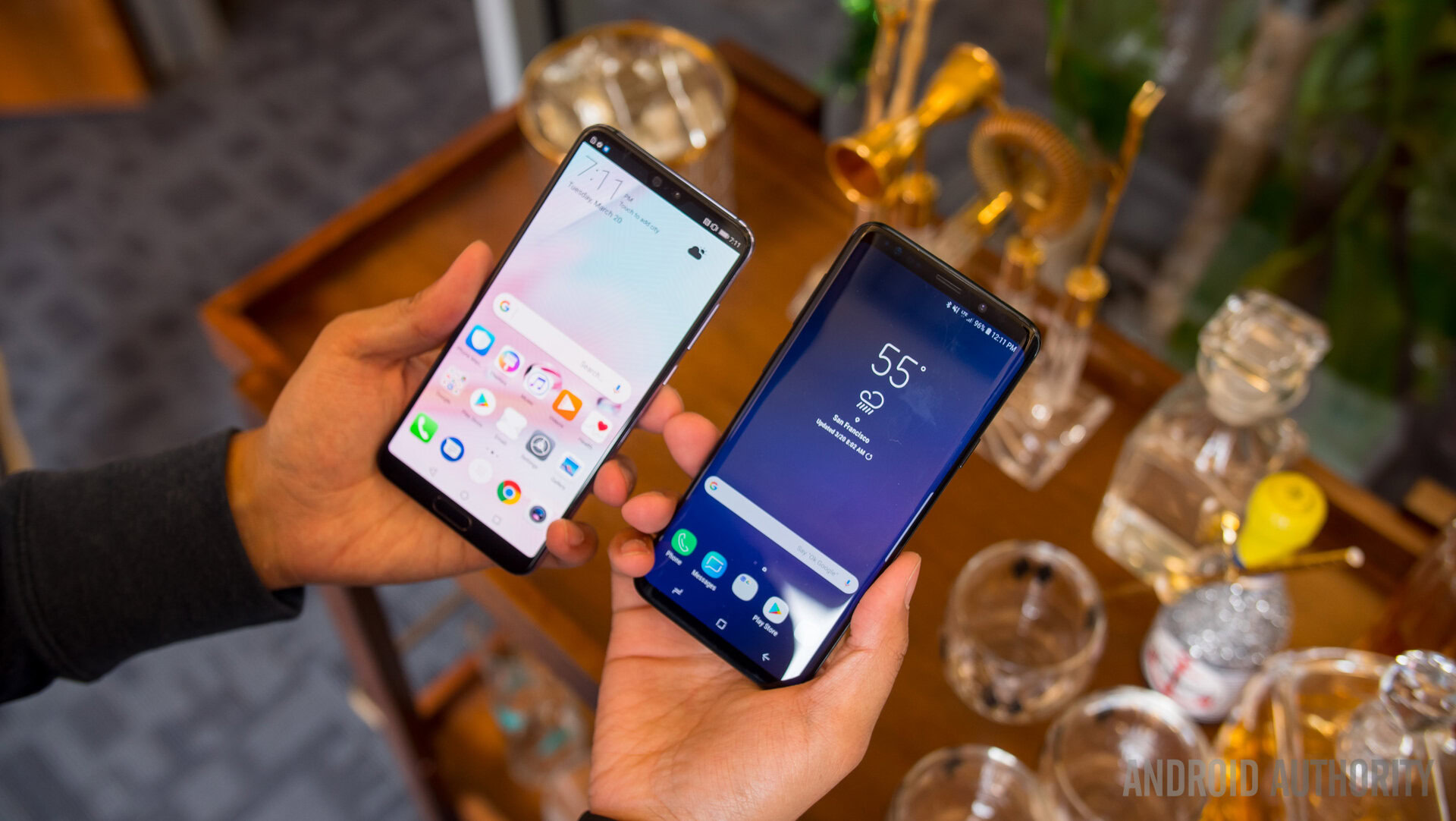 huawei p20 pro vs samsung galaxy s9 plus held in hand