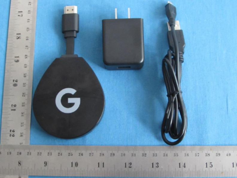 A Google-branded Android TV Stick.