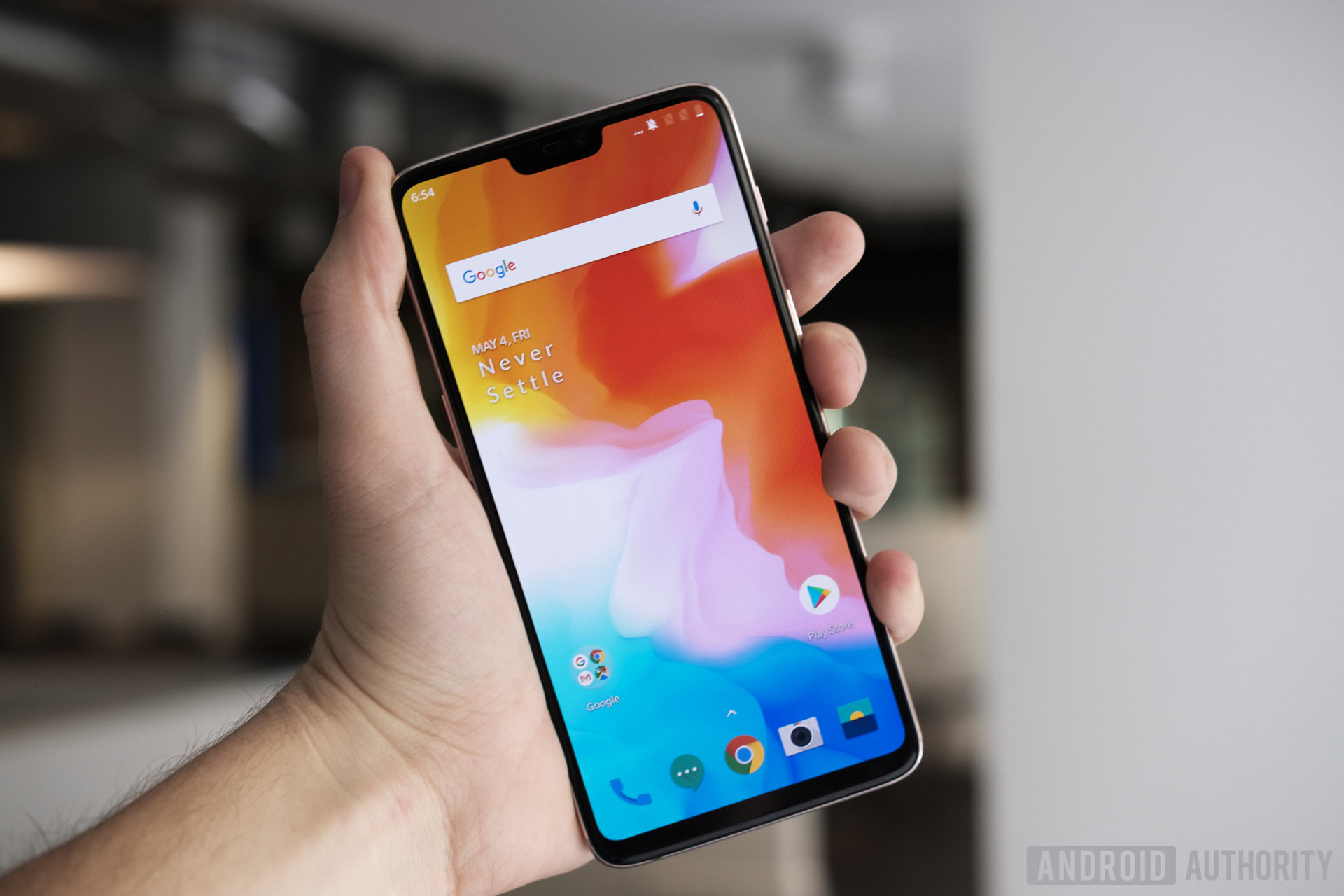 Oneplus 6 held in hand