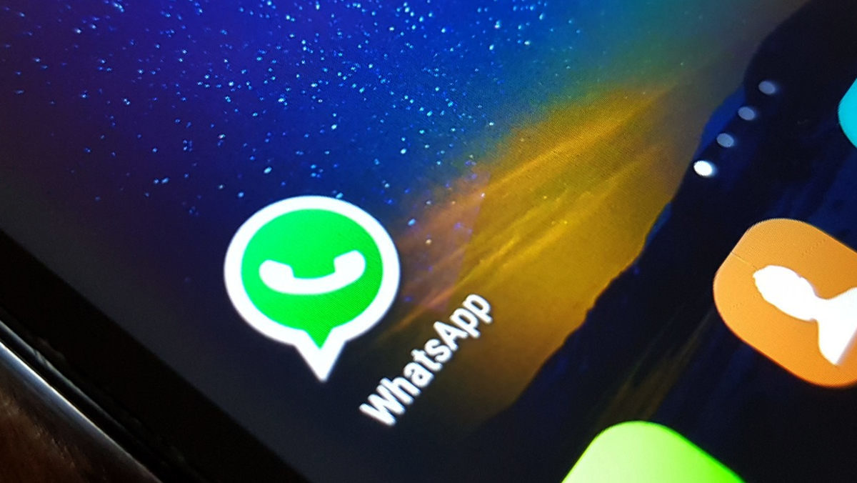 The WhatsApp logo on an Android smartphone.