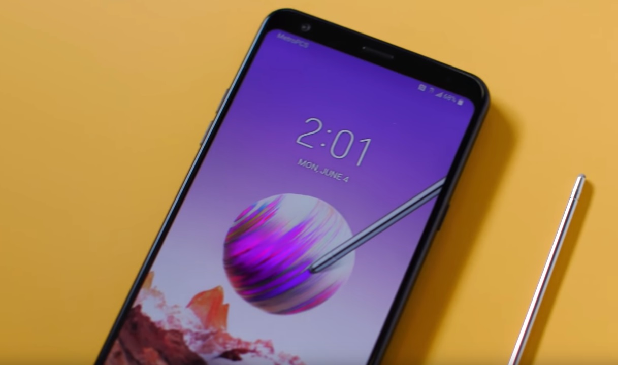 An image of the LG Stylo 4 and its stylus pen Sprint pre-paid phones