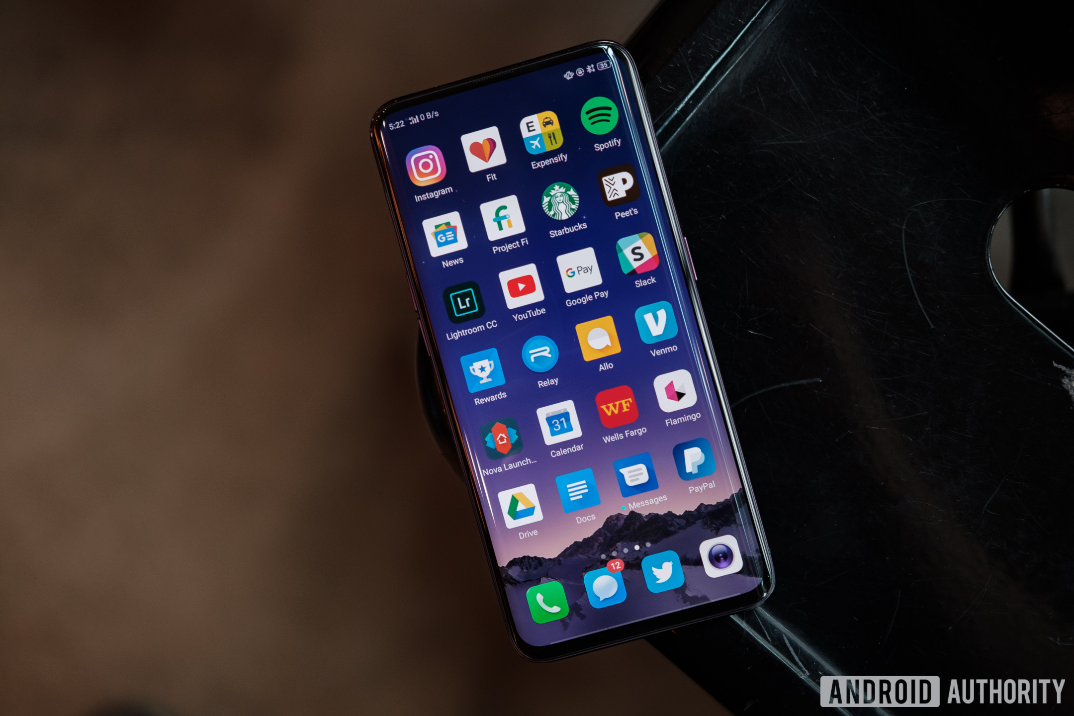 The OPPO Find X on the corner of a table.