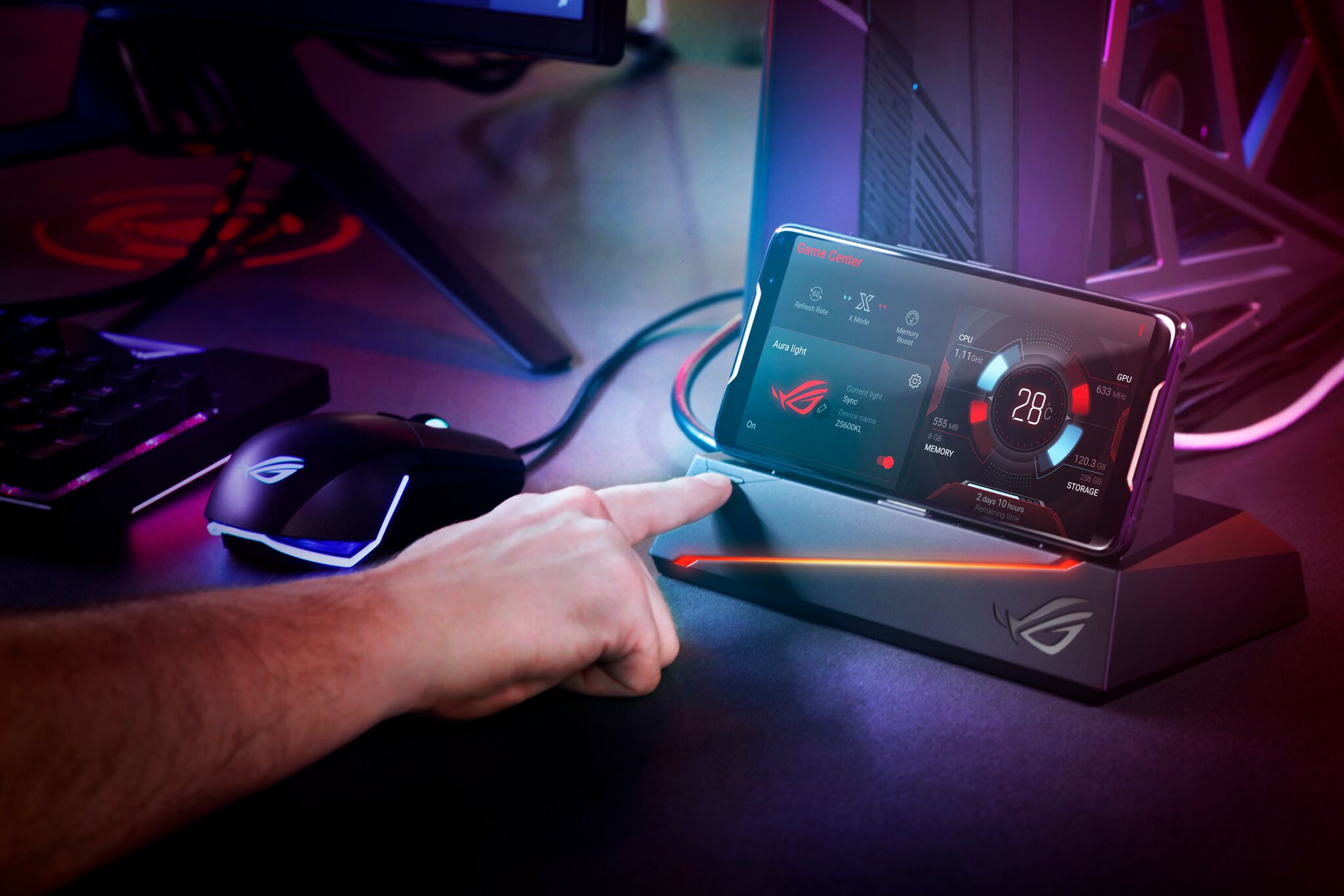 ASUS Rog gaming phone being used with a PC setup.