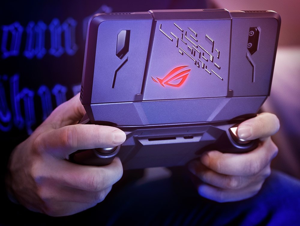 ASUS Rog Phone gaming smartphone in hands from behind.