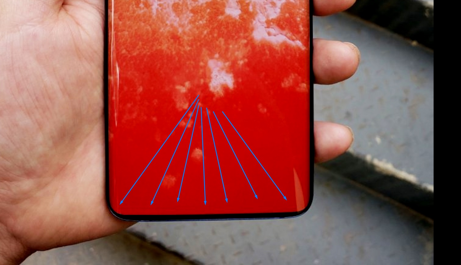 Samsung Galaxy S10 fake photo in a person's hand.