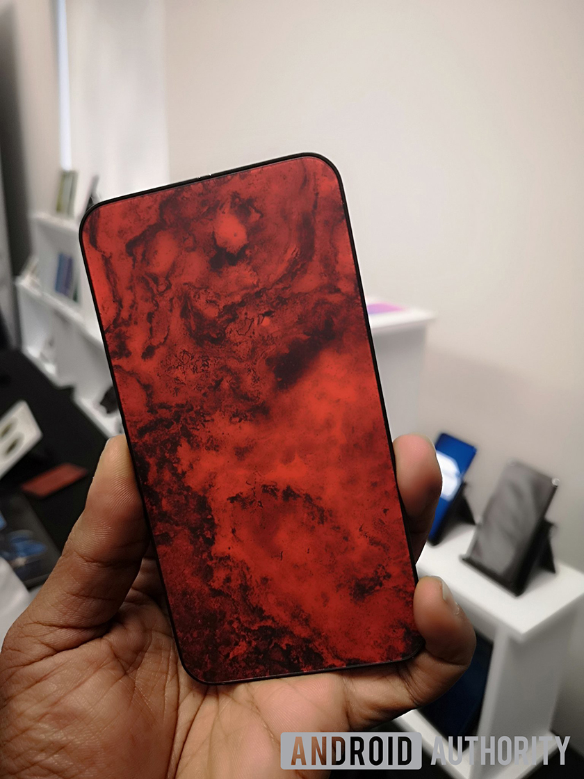 A swirly red design created using Gorilla Glass 6 Ink Jet technology.