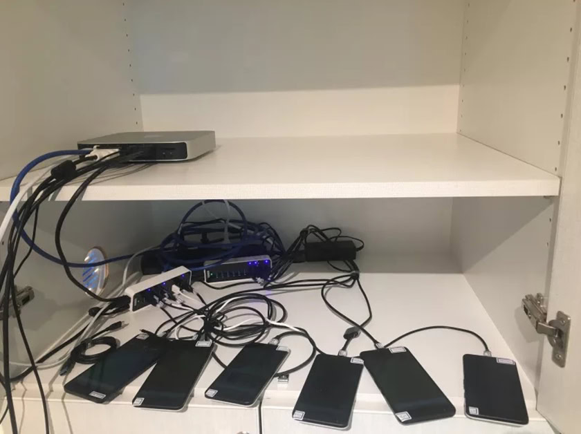 A setup of Android devices as part of a phone listening experiment run by researchers at Northeastern University.