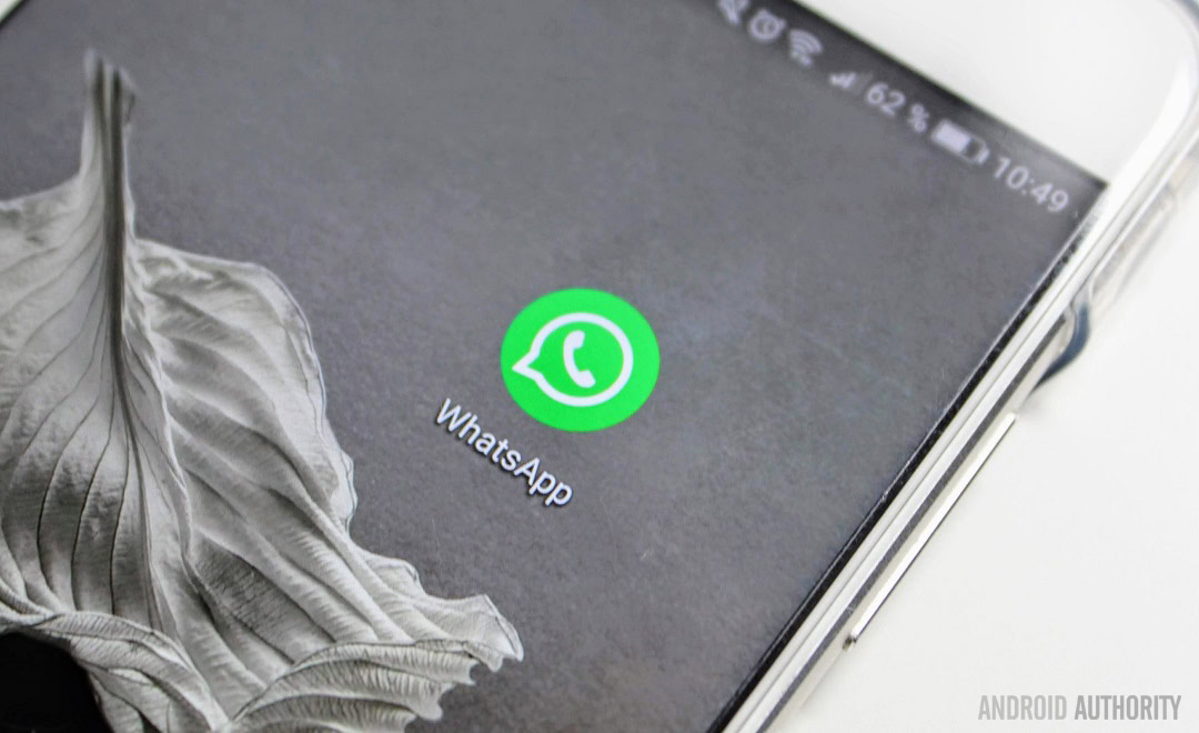 A WhatsApp app icon closeup on a smartphone.