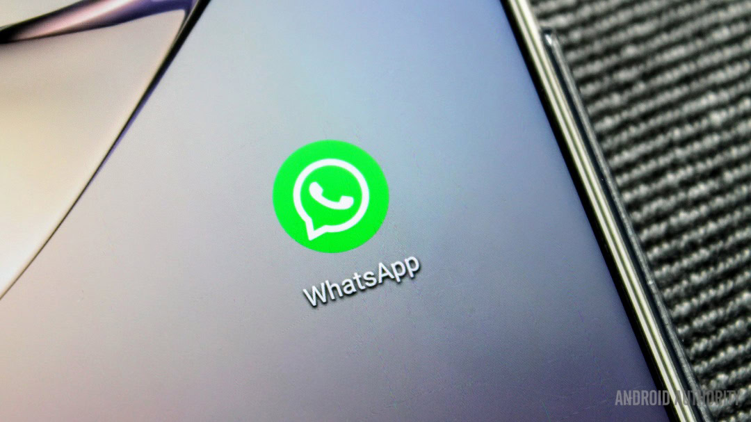 A WhatsApp app icon closeup on a smartphone.