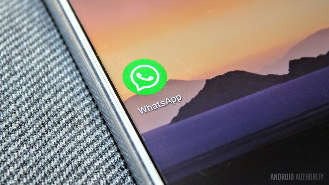 A WhatsApp app icon closeup on a smartphone.