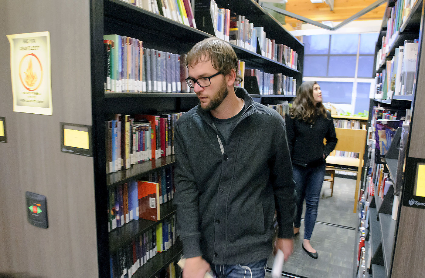 Former library director Adam Winger in a library.