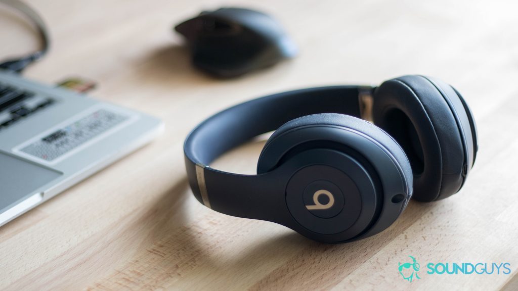 The Beats Studio 4 headphones lie on a table.