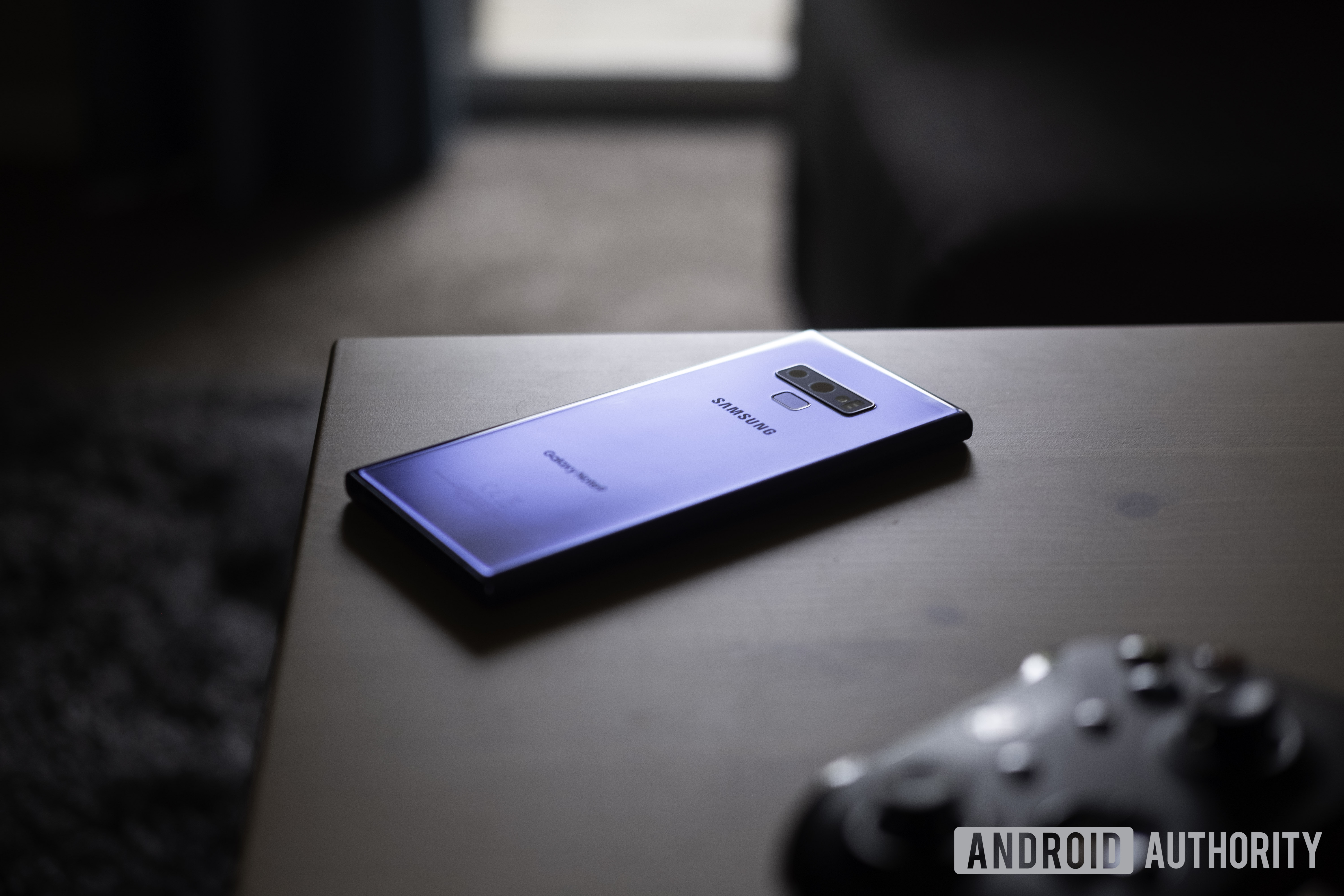 The Samsung Galaxy Note 9 face-down on a table. 