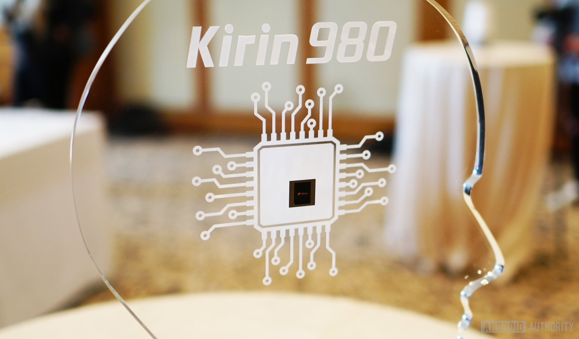 The HUAWEI Kirin 980 chipset in a glass frame. 