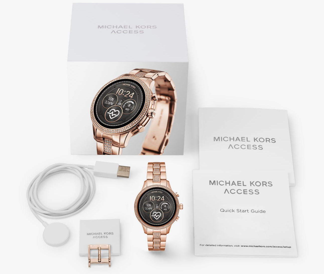 An image of a Michael Kors smartwatch along with its box and accessories.