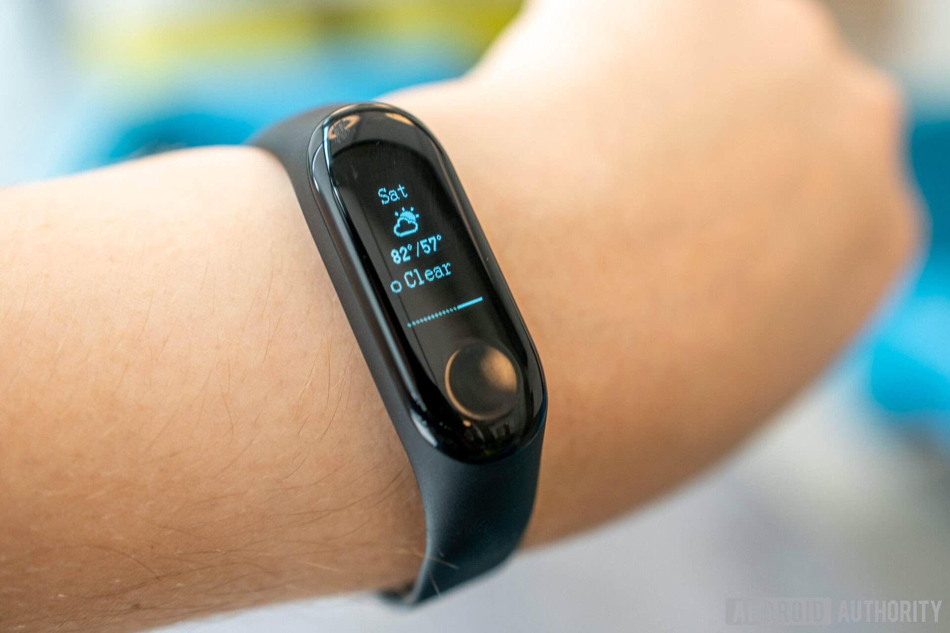 The Xiaomi Mi Band 3 on a person's wrist. 