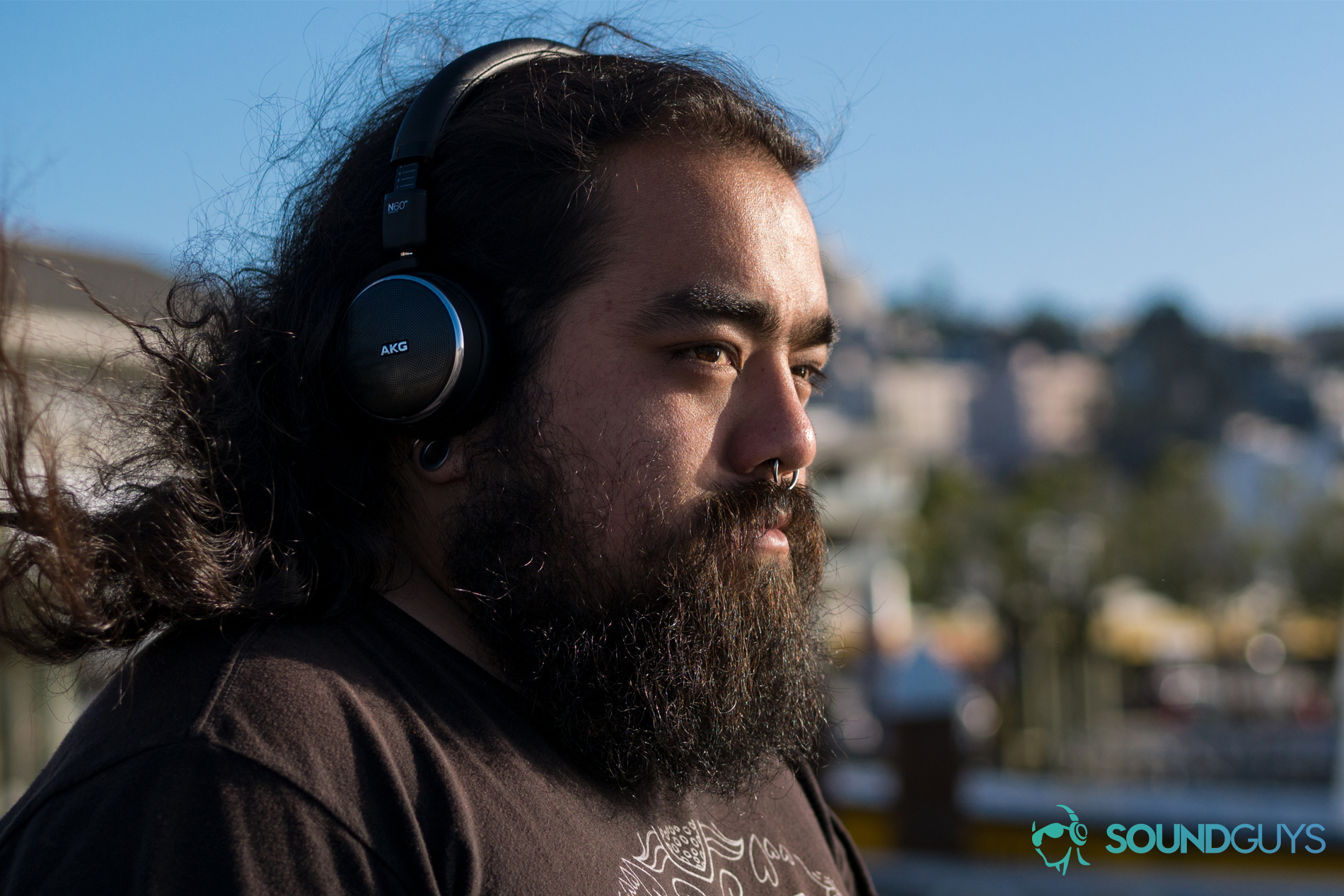 A photo of a man wearing the AKG N60 NC headphones.
