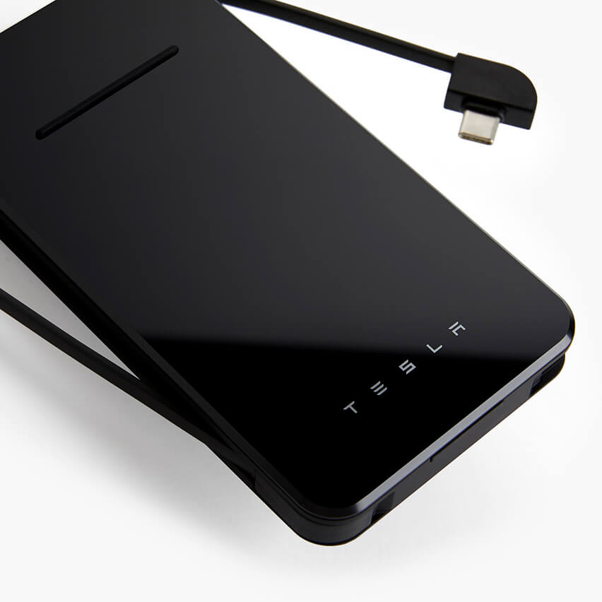 The Tesla Wireless Charger with its Type-C cable.