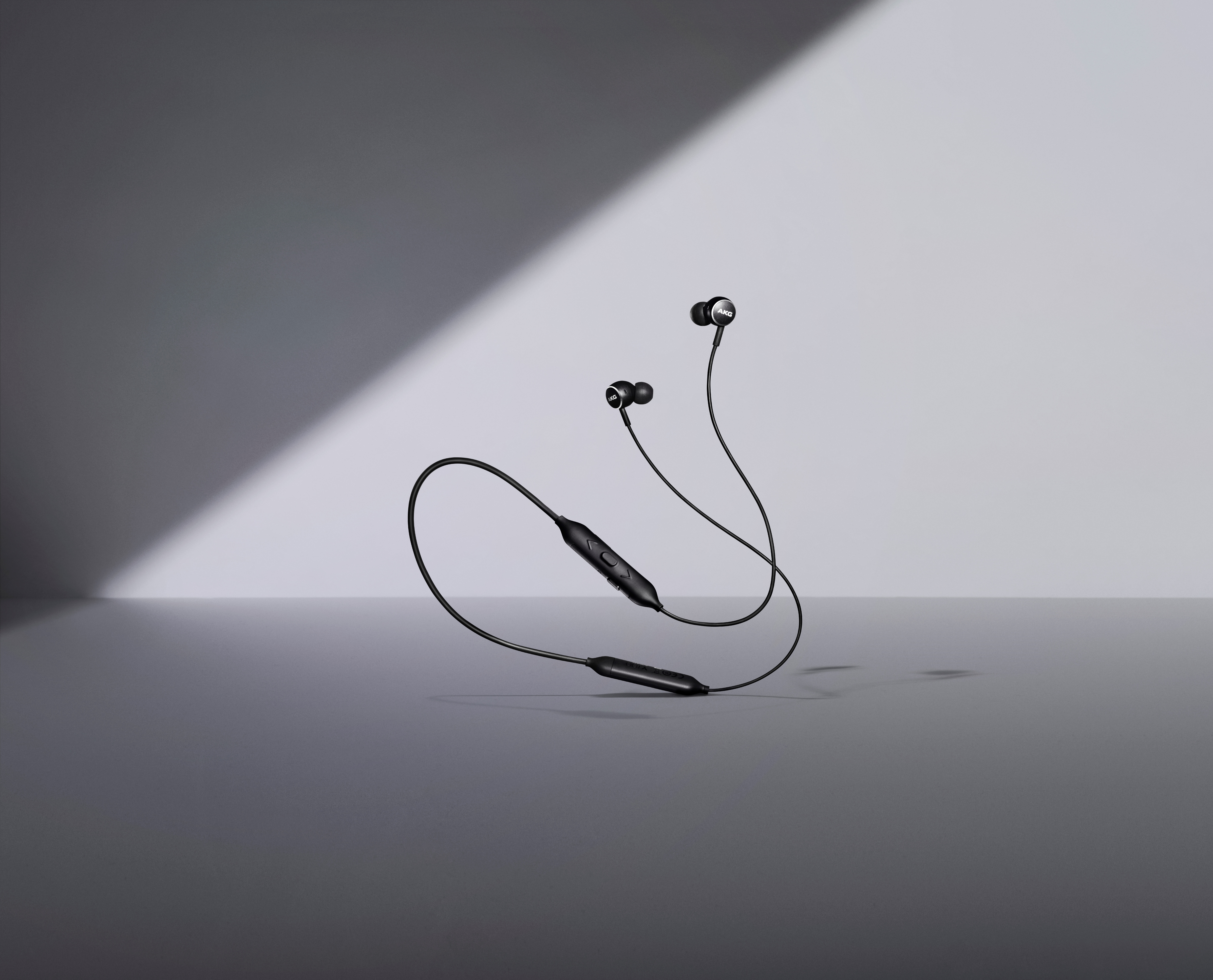 Samsung product image of the AKG Y100 wireless earbuds.