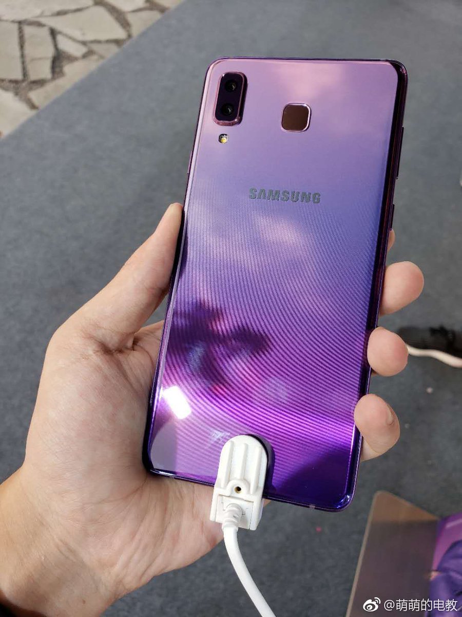 An early leaked image of the Samsung Galaxy A9 Star with gradient purple coloring.