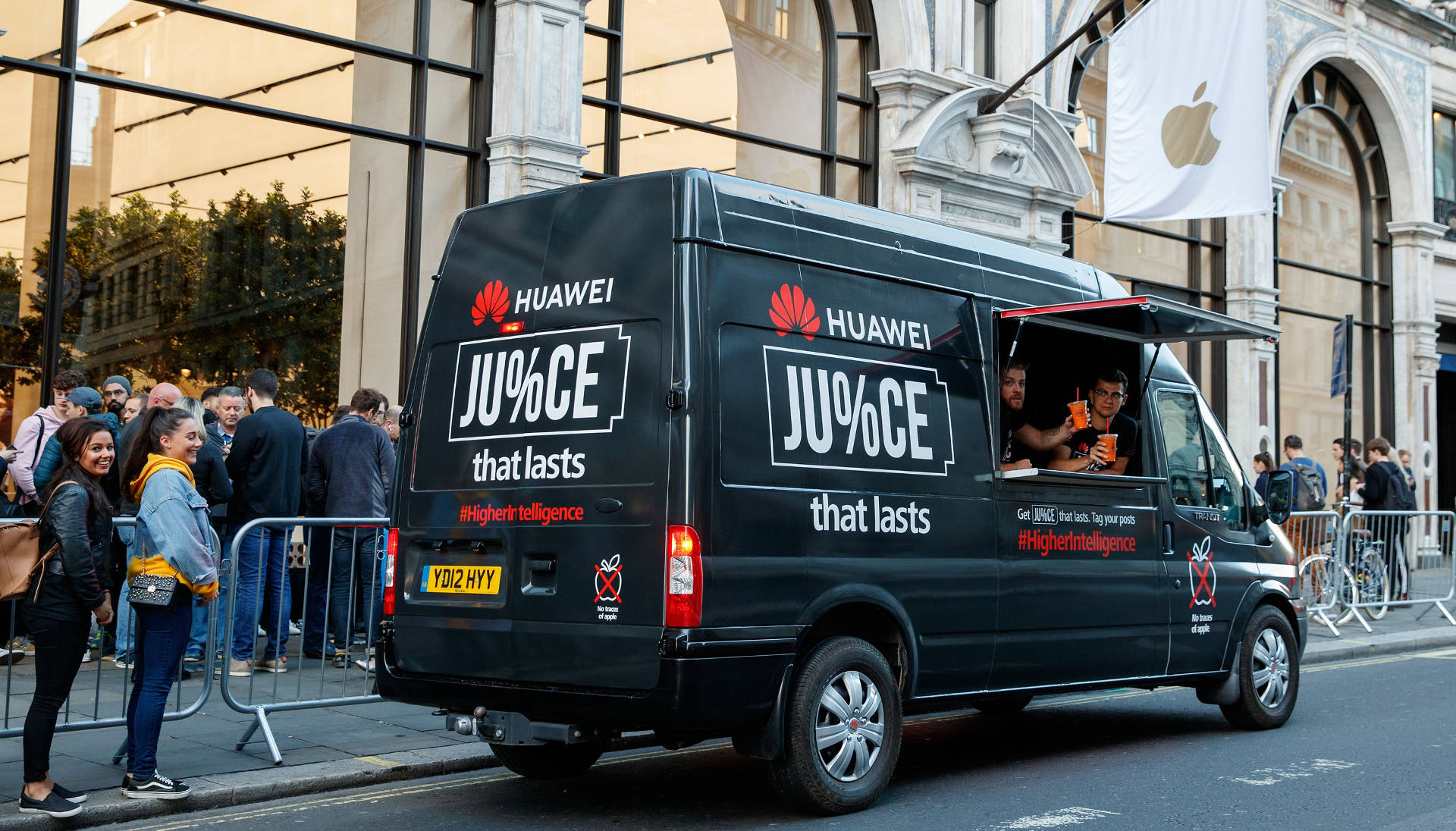 A HUAWEI-branded van near the Regent Street Apple Store.