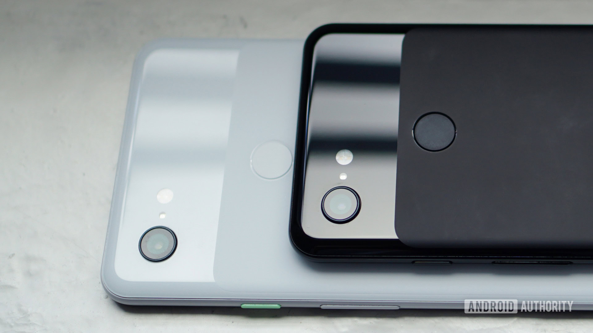 Google Pixel 3 on top of a Google Pixel 3 XL