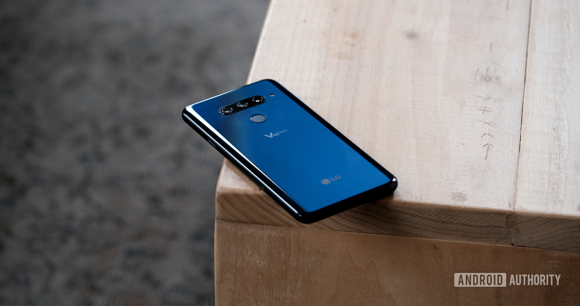 LG V40 ThinQ lying on a table, LG V40 review