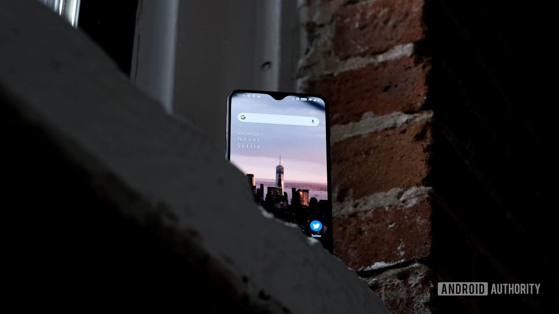 OnePlus 6T screen on windowsill