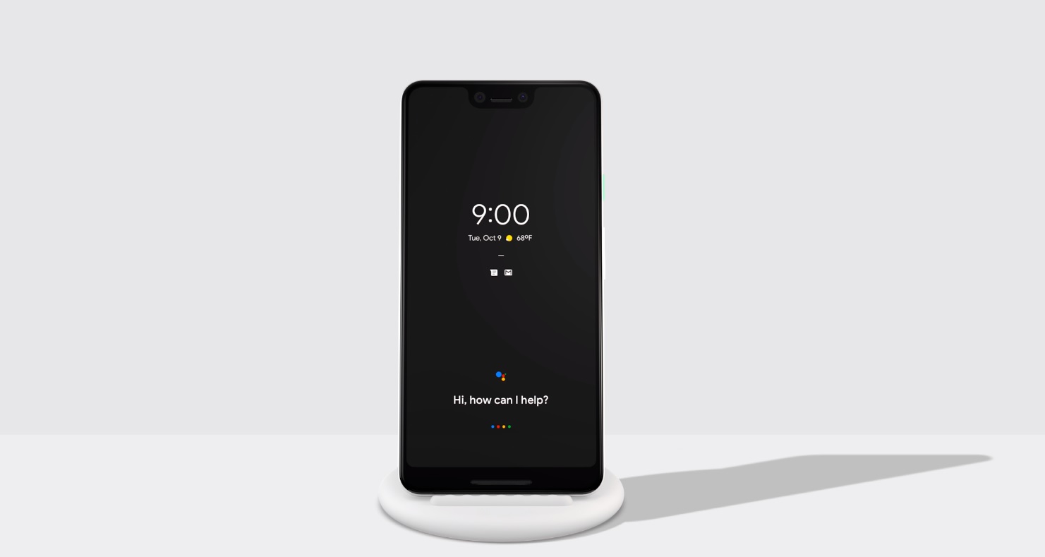 A promotional image of a Google Pixel 3 resting on a Pixel Stand.