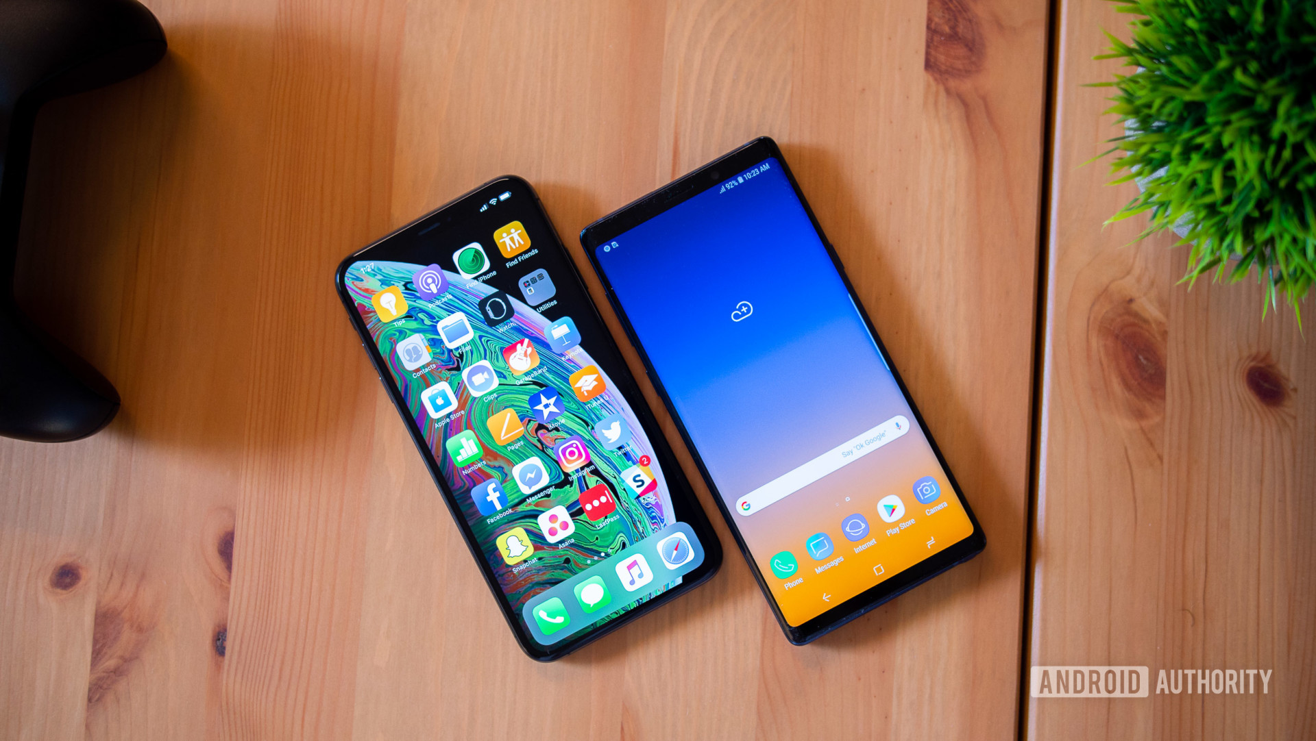 Apple vs Samsung: the Galaxy Note 9 and the iPhone XS Max face-up on a table. 