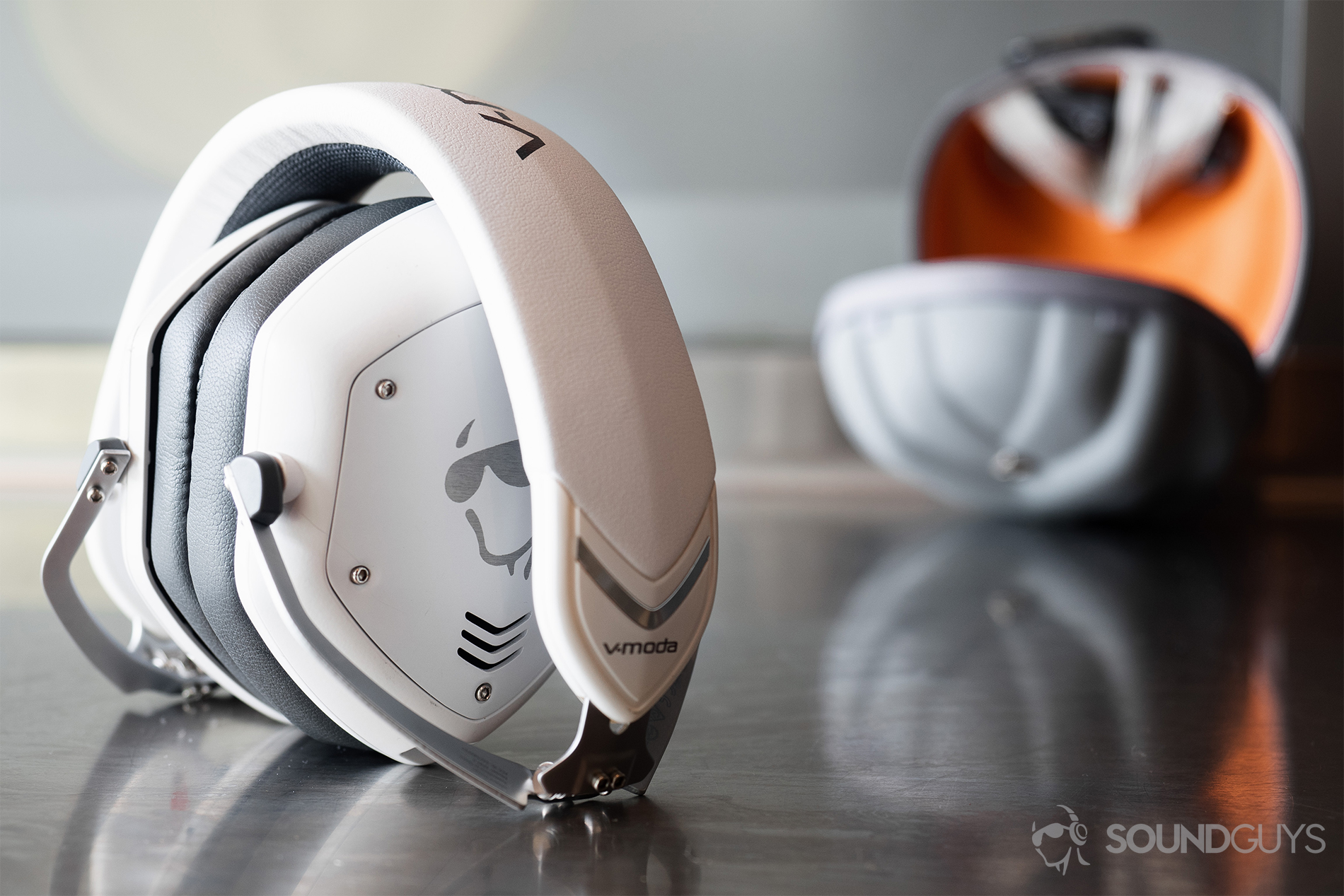 Best Bluetooth headphones: V-Moda Crossfade 2 Wireless Codex with SoundGuys logo on the earcups. The headphones are in white with the clamshell carrying case behind.