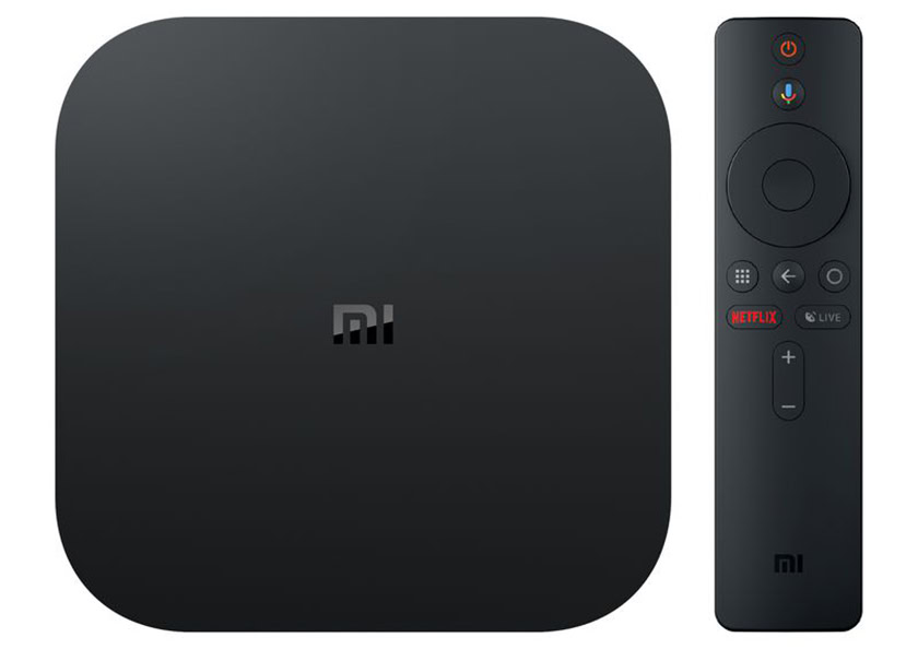 A promotional image fo the Xiaomi Mi Box S with its remote control.