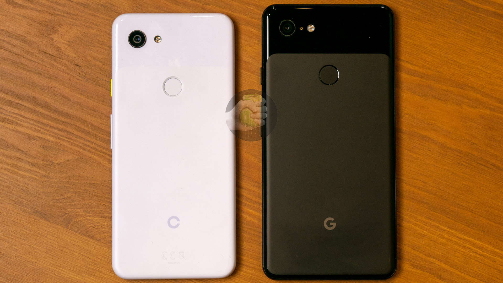Black Google Pixel 3 next to a white version of the anticipated &quot;Google Pixel 3 Lite&quot; expected to be released by Google in 2019