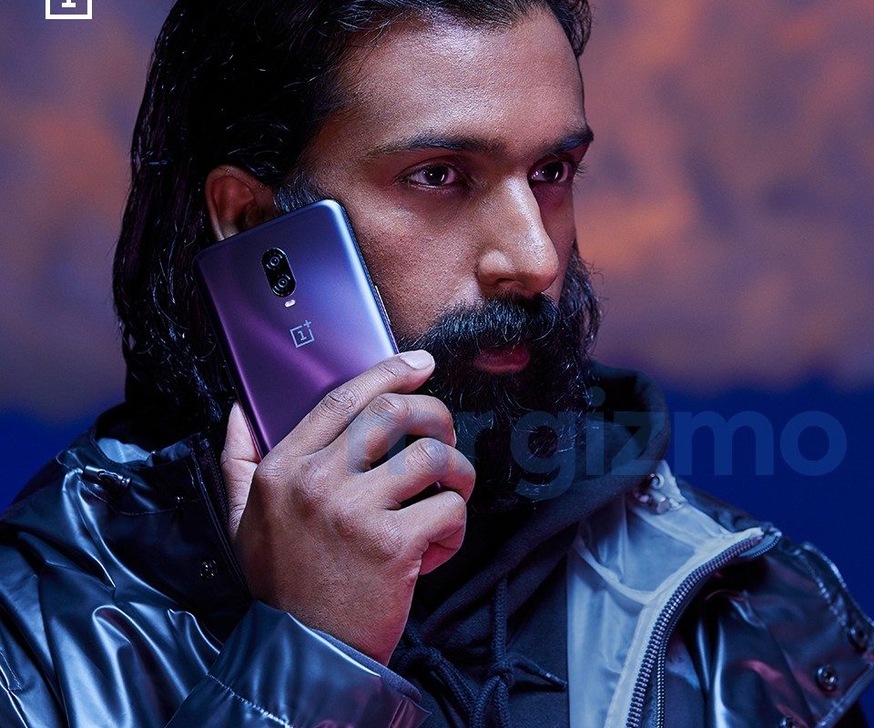 The OnePlus 6T in Thunder Purple in a person's hand.