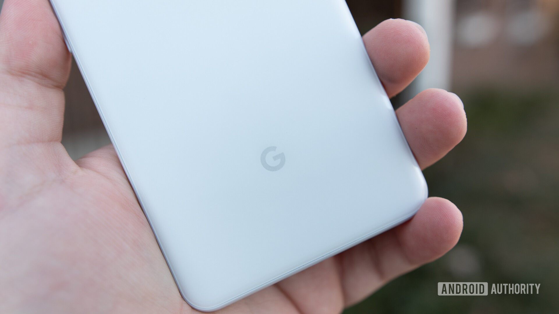 The Google logo on the back of a Google Pixel 3