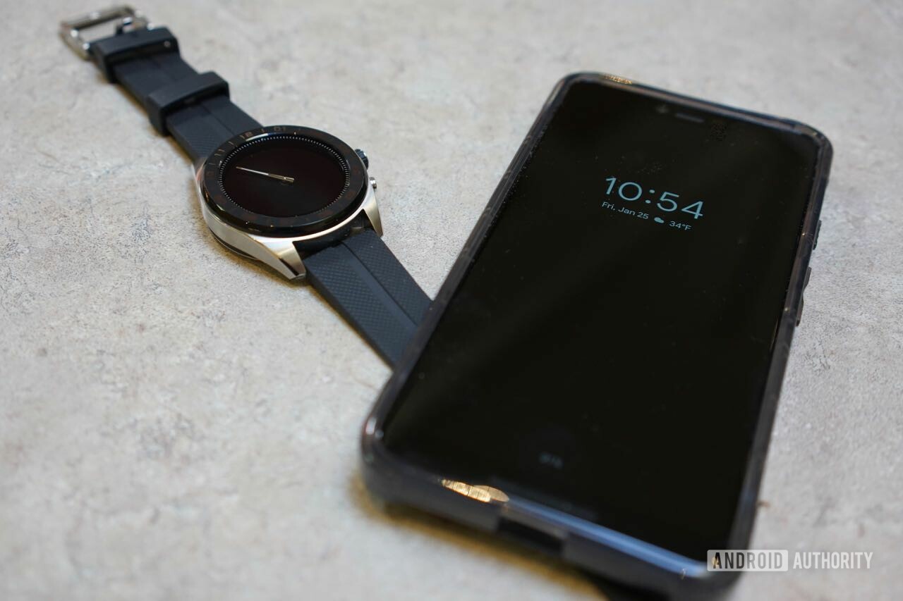 LG Watch W7 next to an Android phone