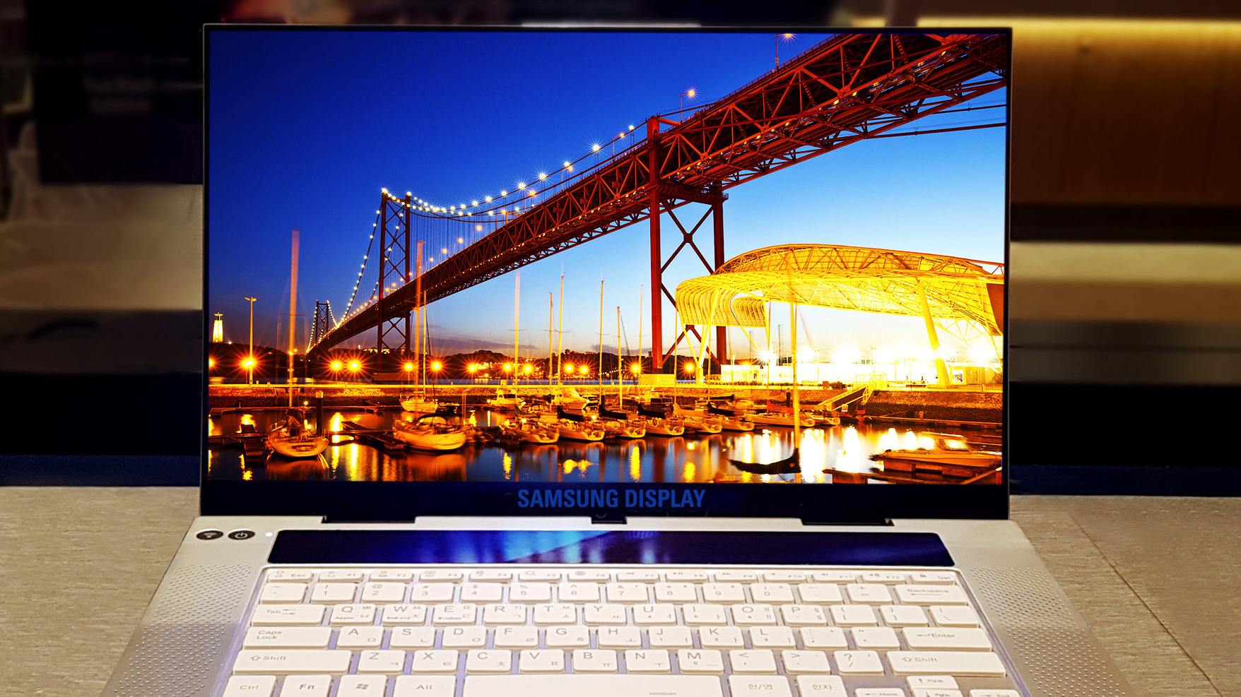 A photo of a prototype laptop featuring the new Samsung UHD OLED 15.6-inch display.